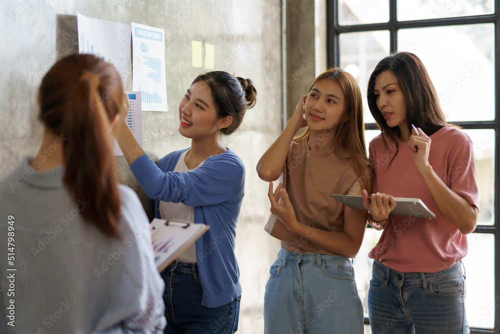 Young creative Asian business woman meeting to plan to work together with new business startup. Young creative Asian business woman meeting to plan to work together with new business startup.