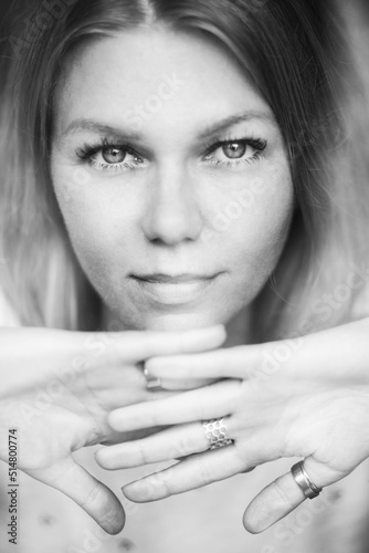 Portrait of a blonde woman with freckles