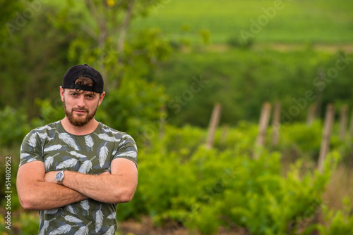 Handsome Young caucasian men, man stubble beard, Portrait wearing khaki shirt countryside, gray background, nature, sexy men bodybuilder, summer day, blue old car vintage, reflection in glass, rain