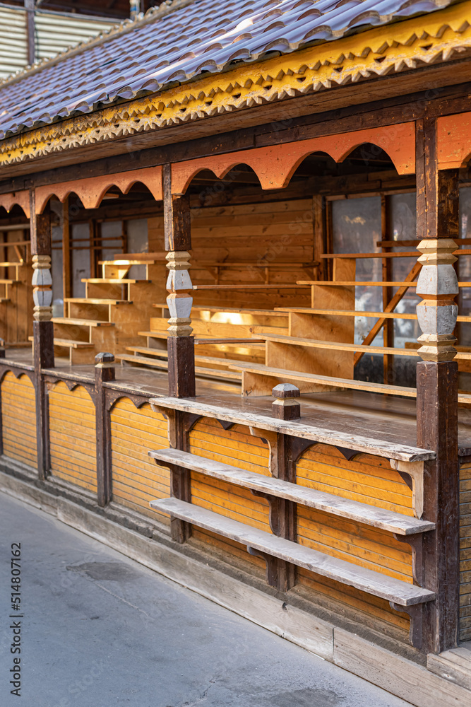 empty wooden stall with a canopy in an empty market empty wooden stall with a canopy in an empty market