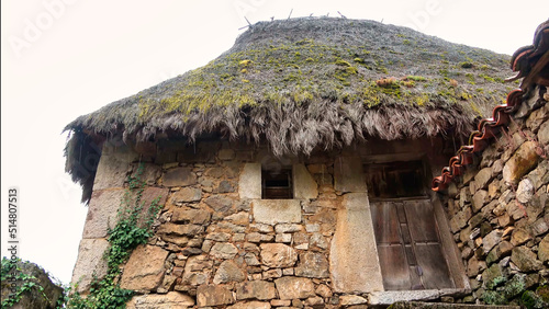 photographic image, houses of old construction stones and plant elements, town of, Asturias. Spain photo