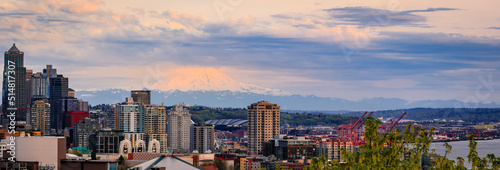 City skyline panorama with Mount Rainier at sunset in Seattle, Washington photo