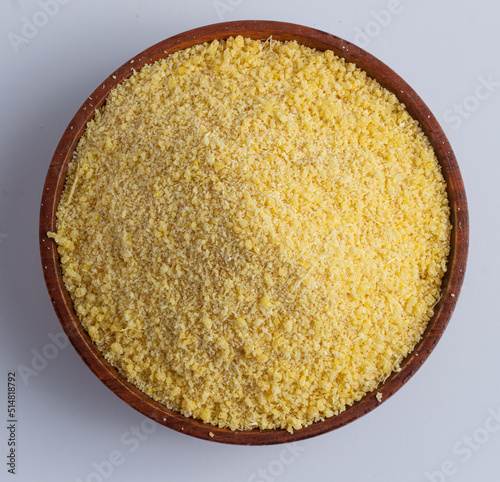 Εκτύπωση καμβά Nigerian yellow and white garri in a wooden bowl.