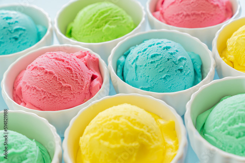 Colorful ice cream balls on bright background