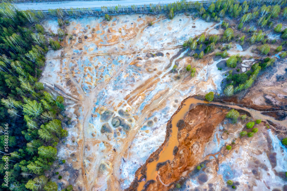 Aerial view of opencast mining quarry. Industrial place view from above. pollution of ecology