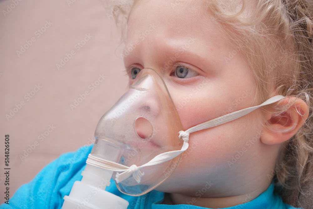 cute caucasian girl is ignited using a nebulizer cute caucasian girl is ignited using a nebulizer