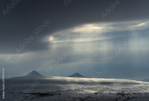 Panoramic view of Blue hour of the mountains, snow and Sea in Svalbard, Norway.