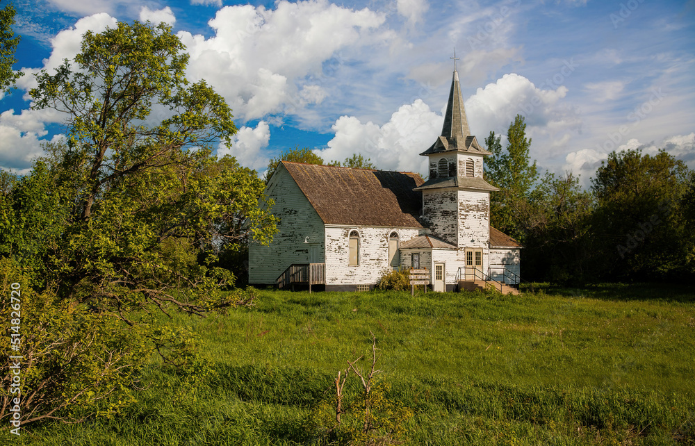 A abandoned country church in a wetland in north easter North Dakota.