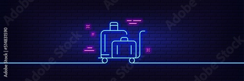 Neon light glow effect. Luggage trolley line icon. Suitcase bag sign. Baggage claim symbol. 3d line neon glow icon. Brick wall banner. Luggage trolley outline. Vector