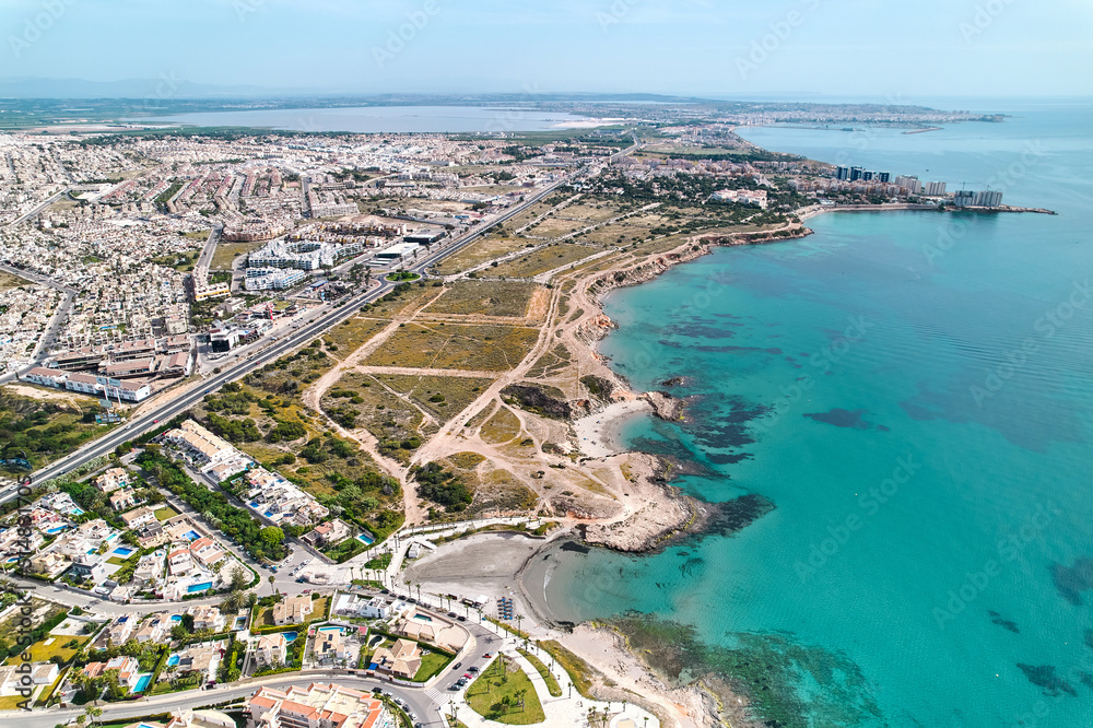 Costa Blanca seaside with turquoise Mediterranean Sea, aerial shot