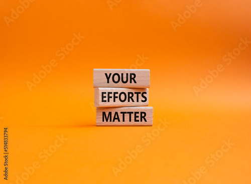 Your Effort Matter symbol. Wooden blocks with words Your Effort Matter. Beautiful orange background. Business and Your Effort Matter concept. Copy space.