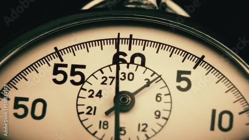 Analog stopwatch close-up. Counting time by stopwatch. Time measurement. Time management concept.A tool for measuring time.Dial stopwatch arrow.