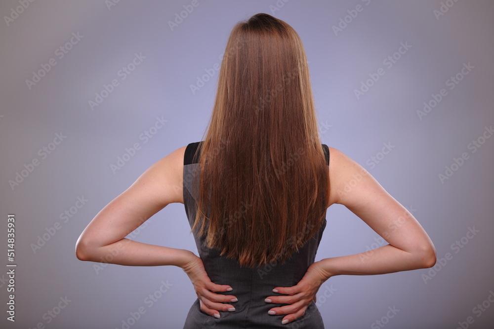 Back woman with long hair isolated female portrait. Back woman with long hair isolated female portrait.