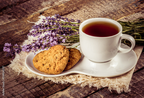 Obraz na płótnie Cup of tea with lavender and cookies w salonie