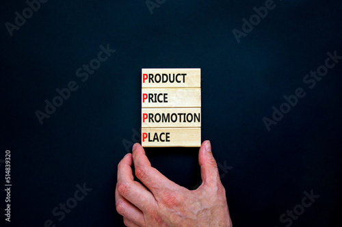 PPPP product price promotion place symbol. Concept words PPPP product price promotion place on wooden blocks on beautiful black background. Business and PPPP product price promotion place concept. photo