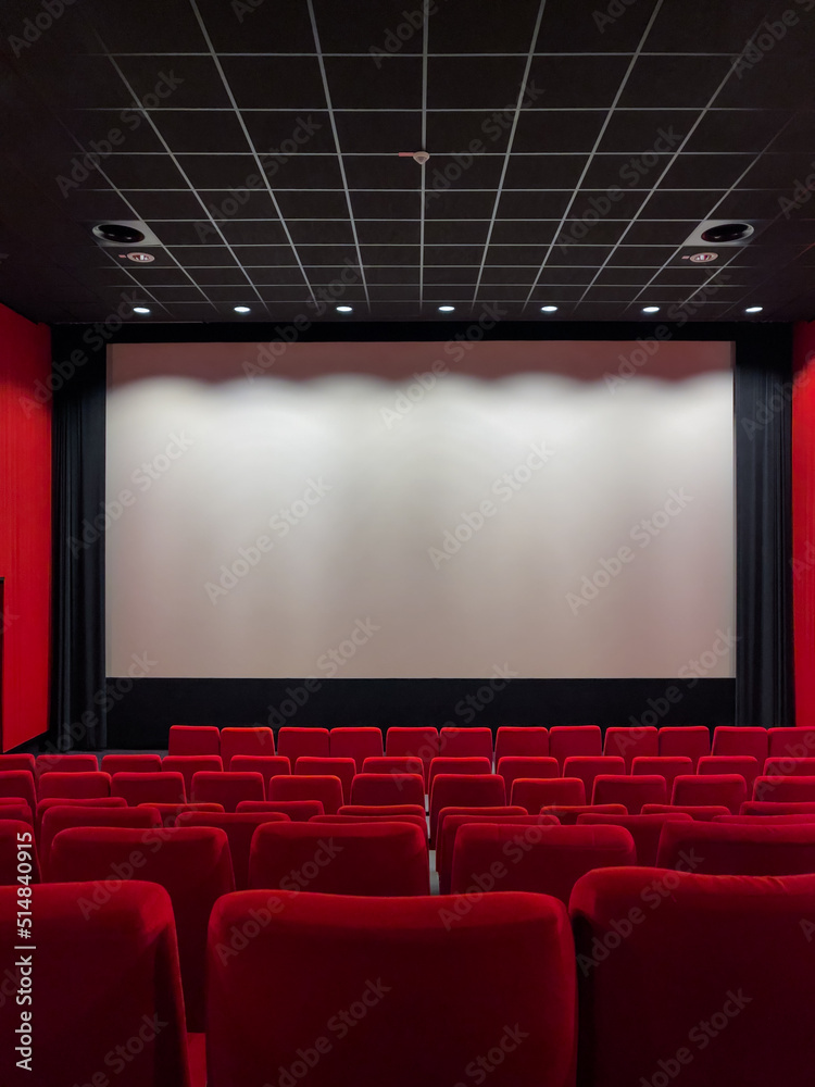 Cinema Screen  And Red Seats. Empty Screening Theater