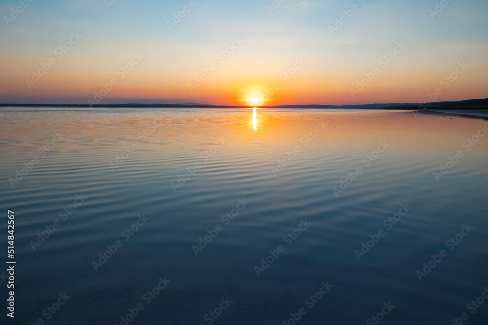 Sunset over the lake background photo. Inspiration or quote or religious concept