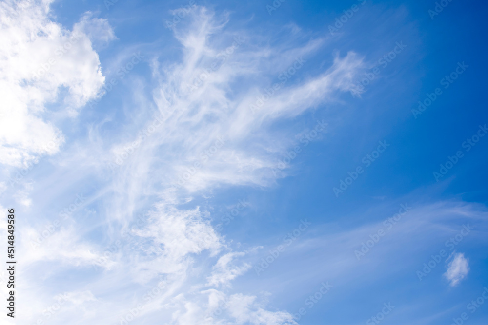 white light clouds in the blue sky