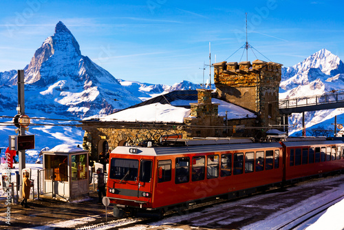 Railway station in Gornergrat, Switzerland. Matterhorn mountain visible in background. photo