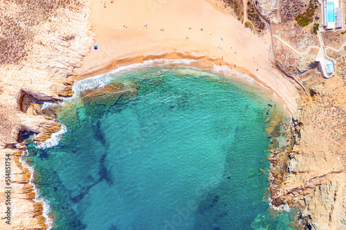 Aerial drone view of Fokos beach on Mykonos island, Greece