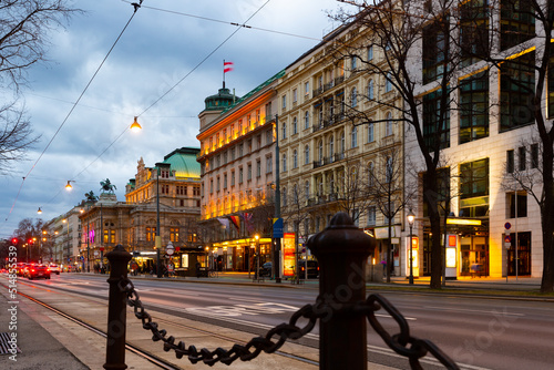 Photography Wide shot of traffic passing the Opernring and Vienna State Opera in Vienna, Aus