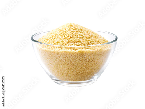 organic couscous in a clear glass bowl isolated on white background.