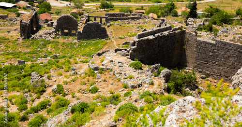 Ruins of the ancient city Sillyon. Ancient ruins with roman baths photo