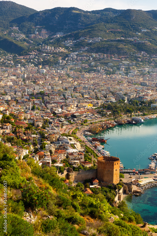 Modern landscape of Alanya city with old Kizil Kule tower, view from above