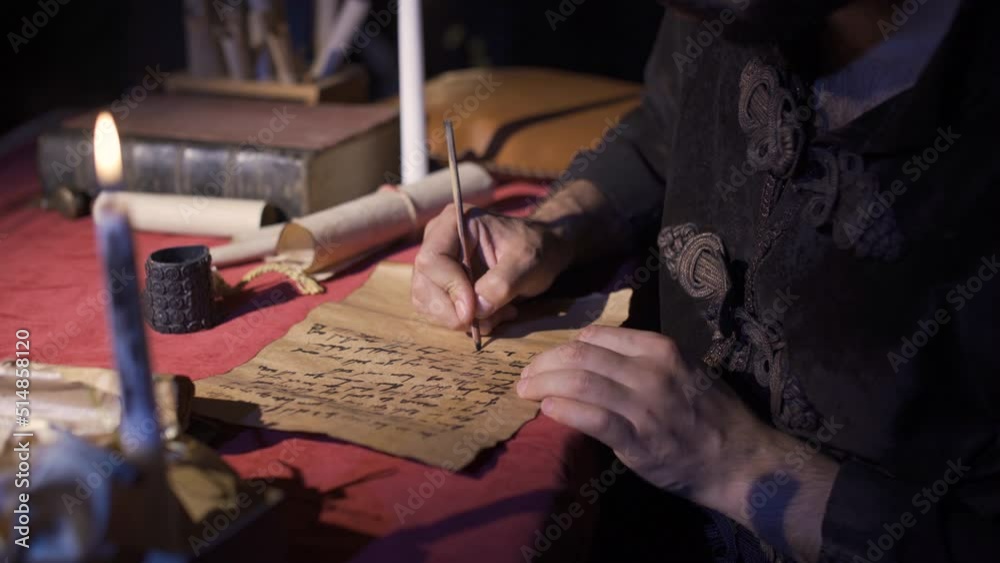 Writing letters with pen and paper in ancient times. Historical scenes.
Person writing letters on historical papyrus paper using ink and pen. Historical vehicles.
