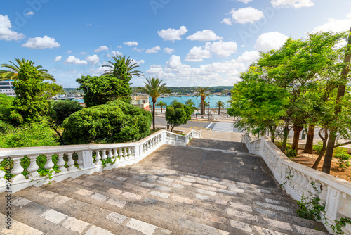 View of the Georgian architecture, Mediterranean Sea and port harbor from the grand staircase leading to the historic old town of Mahon or Mao on the Island of Menorca, Spain. 