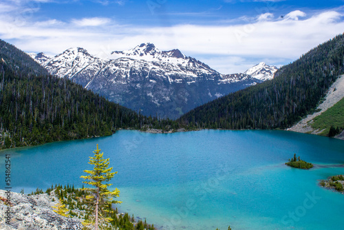 Lake with blue water and snowy mountains on the background in Joffre Lakes, BC, Canada