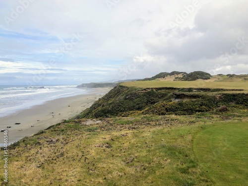 A beautiful view of a beautiful par 4 golf hole right along the endless coast of the pacific ocean, outside of Bandon, Oregon, USA.
