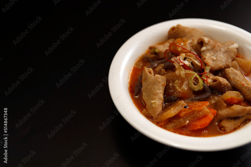 Japanese cuisine motsuni with internal organs simmered on the table