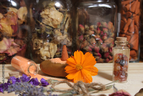 Incense Cones on Stone Slab With Crystals and Flowers