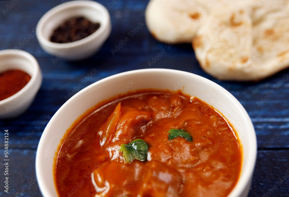 Indian chicken curry roux like tomato soup on the table Indian chicken curry roux like tomato soup on the table