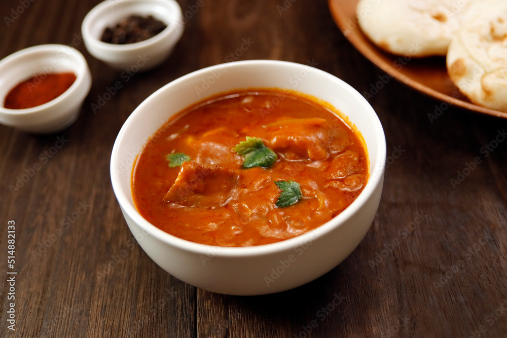 Indian chicken curry roux like tomato soup on the table Indian chicken curry roux like tomato soup on the table