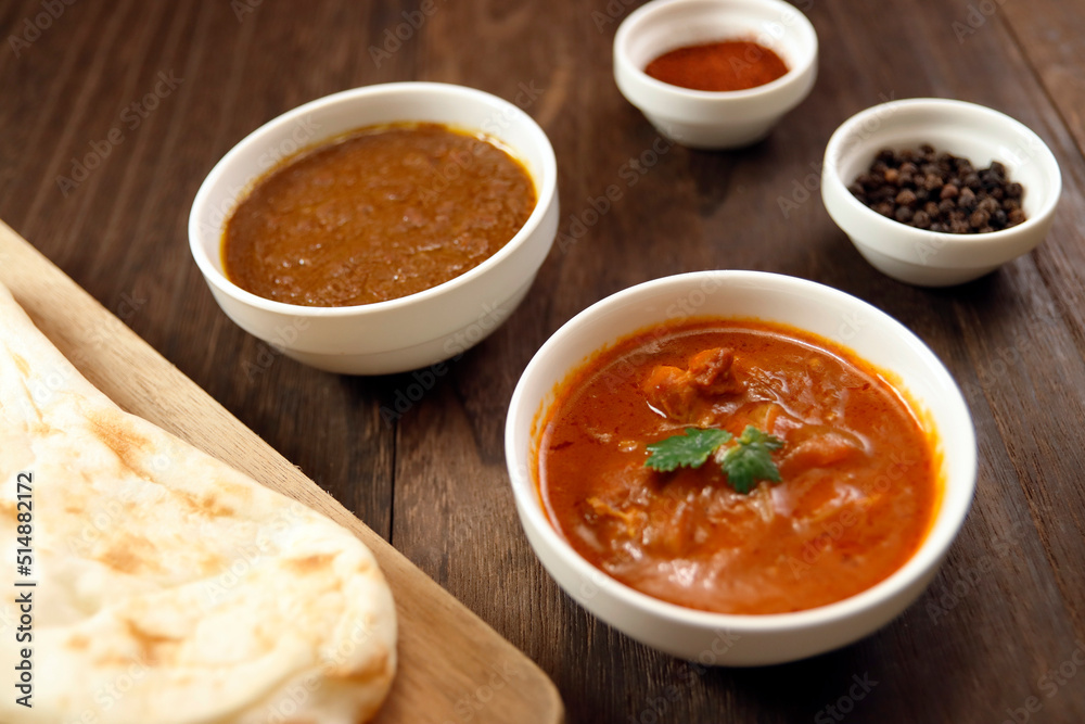 Indian chicken curry roux like tomato soup on the table Indian chicken curry roux like tomato soup on the table