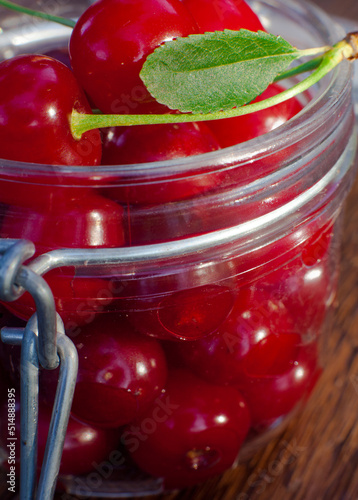 fresh cherries in a glass jar