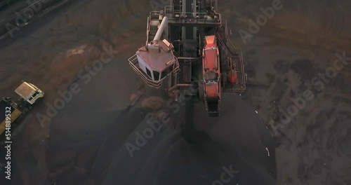 Coal Mineral Being Stacked Through A Conveyor Belt In The Coal Handling Terminal Of Paradip Port, Odisha, India. High Angle Drone Pullback photo