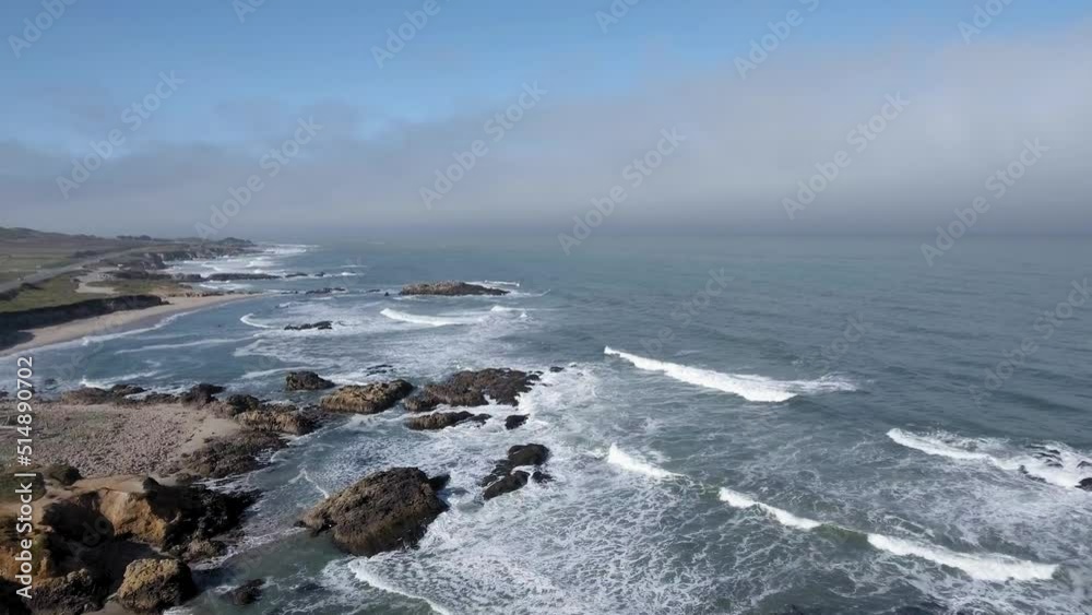 Waves washing ashore on rugged coastline of Big Sur, California Waves washing ashore on rugged coastline of Big Sur, California