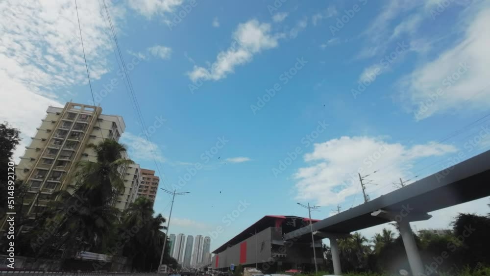 Mumbai road traffic blue sky bike car pov metro station India Maharashtra skyline cityscape wstern express highway Mumbai road traffic blue sky bike car pov metro station India Maharashtra skyline cityscape wstern express highway