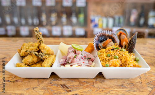 Peruvian food: Fish ceviche, rice with seafood and fish cracklings.