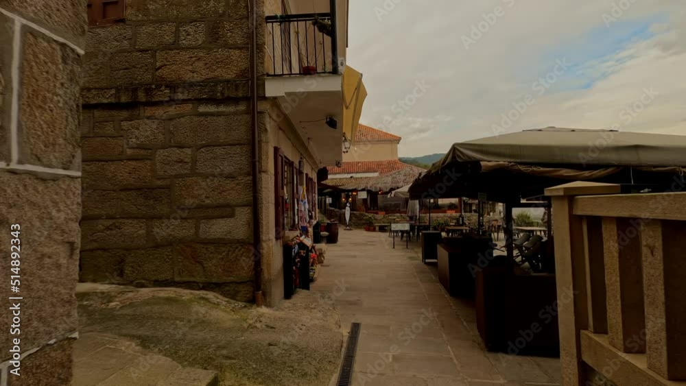 Scene with souvenir shops and restaurant on coast of Combarro, Spain. Aerial Scene with souvenir shops and restaurant on coast of Combarro, Spain. Aerial