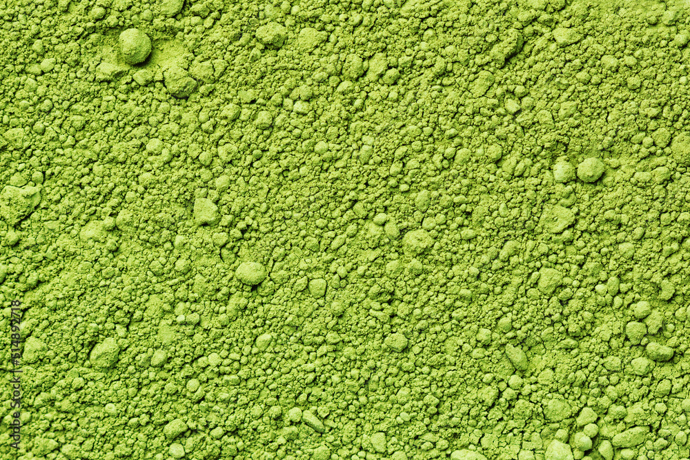 Green matcha tea powder background. Herbal matcha tea texture. Green matcha tea powder background. Herbal matcha tea texture.