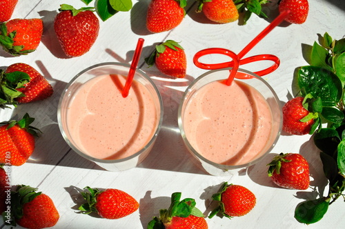 Fototapeta Naklejka Na Ścianę i Meble -  Fresh Strawberry smoothie and strawberry berries.