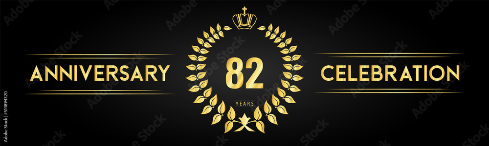 Naklejka premium 82 years anniversary celebration logo with laurel wreath and royal crown isolated on black background. Premium design for happy birthday, wedding, celebration events, greetings card, graduation.