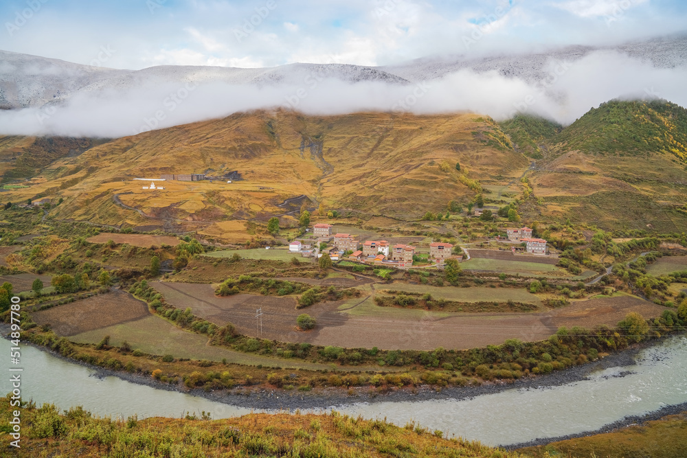 Fototapeta premium Beautiful scenery of grasslands, pastures and villages in Western Sichuan Province, China