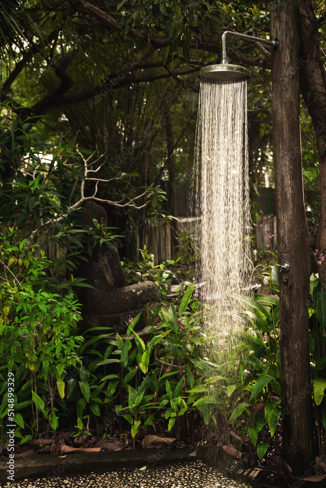Outdoor open-air shower in the tropical jungle Outdoor open-air shower in the tropical jungle