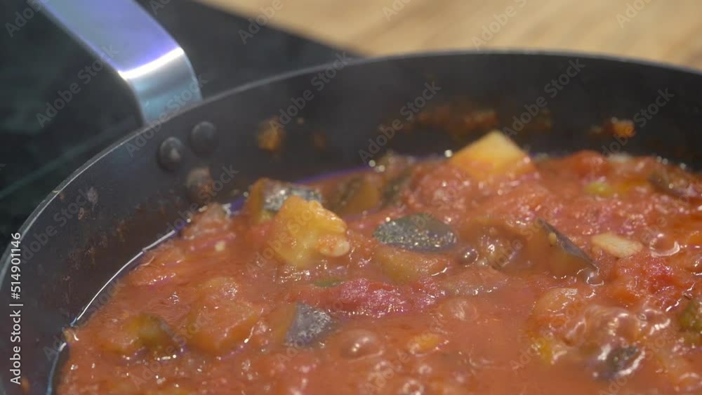 Cooked vegetable ratatouille, traditional vegetable dish Steaming in a Pan Cooked vegetable ratatouille, traditional vegetable dish Steaming in a Pan