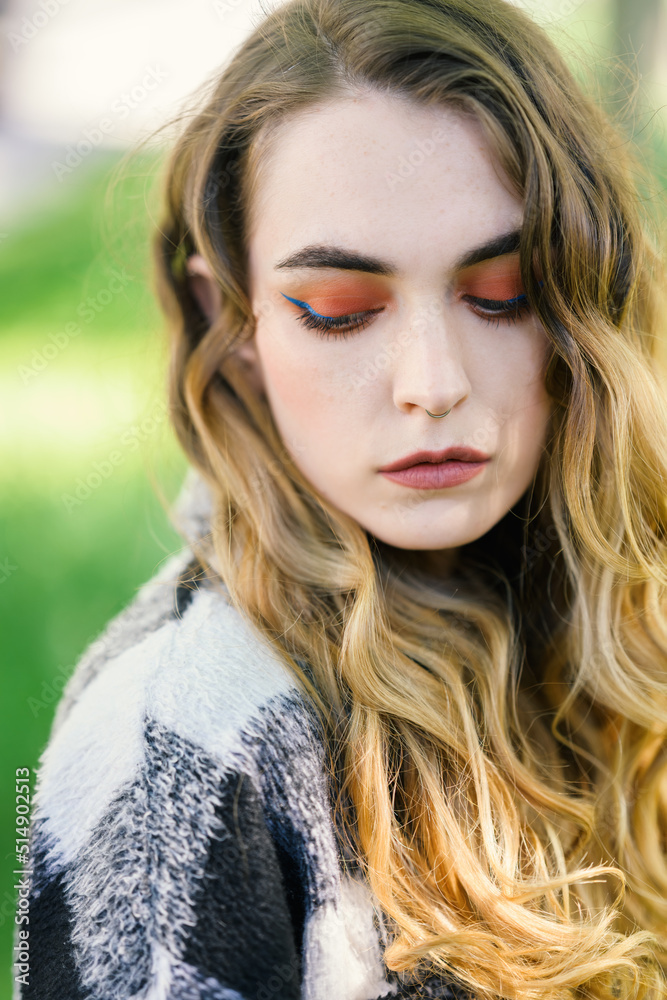 Portrait of young beautiful woman. Natural light. Shallow depth of field. Portrait of young beautiful woman. Natural light. Shallow depth of field.
